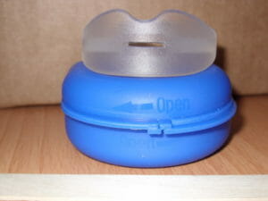 Original Snoredoc Mouthpiece front view on top of storage case