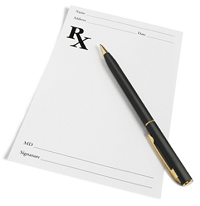 Blank prescription pad with pen laying on top 