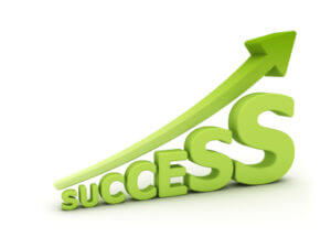 The word success with arrow pointing upward 