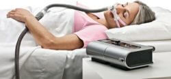 Woman using CPAP Machine