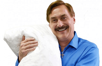 Mike Lindell holding a My Pillow